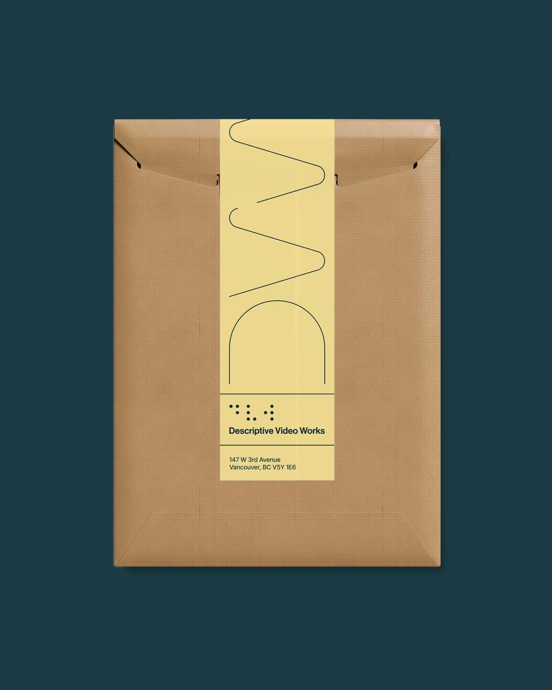 Descriptive Video Works branded kraft package with yellow graphic label.