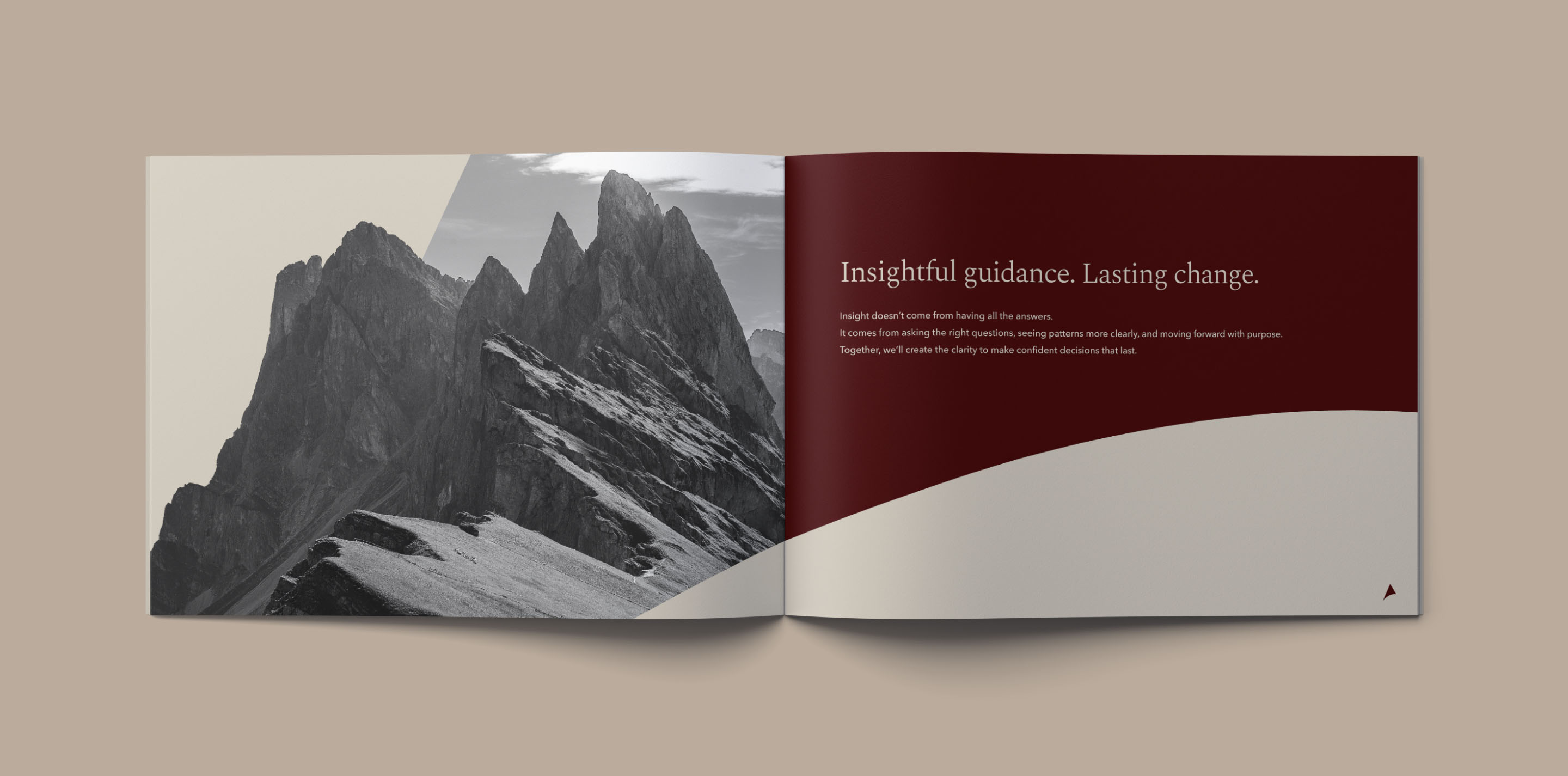 Open Gracehill Consulting brochure combining mountain photography with oxblood brand graphics.