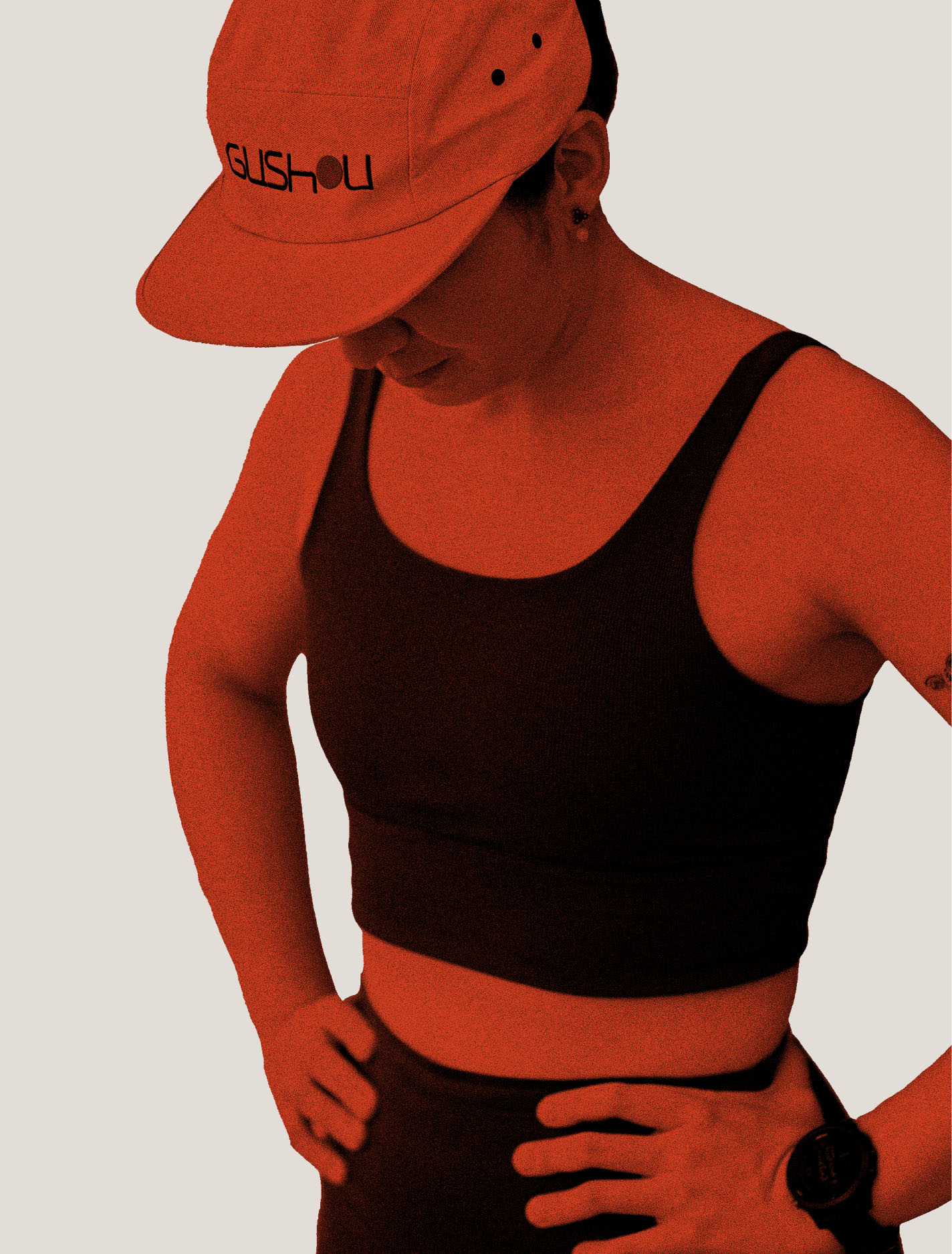 Athlete wearing Gushou branded cap and athletic clothing.