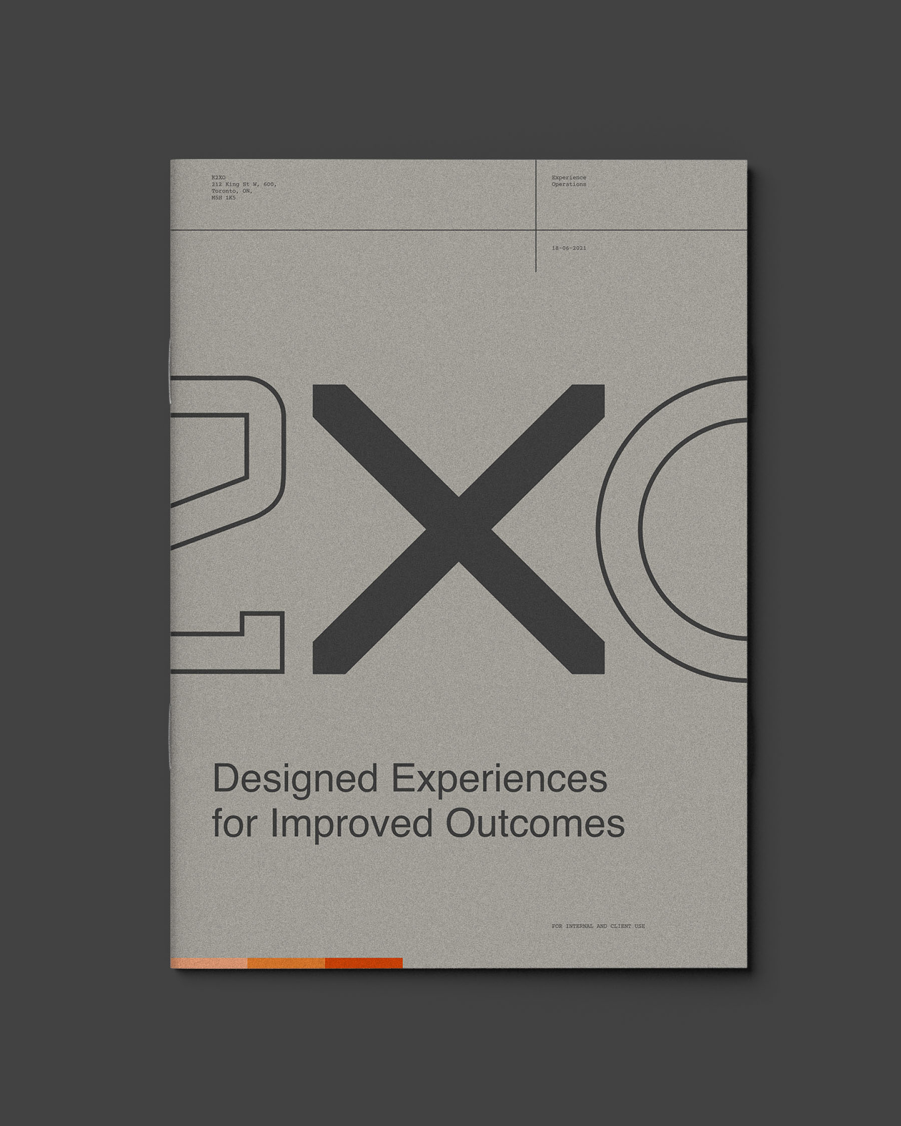 K2XO brochure cover featuring oversized geometric typography and the message 